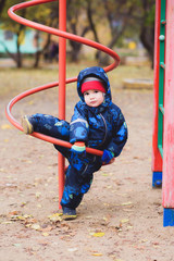 beautiful child playing on the playground