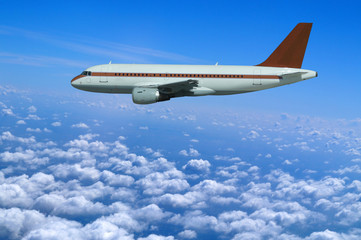 Fototapeta na wymiar Safe flight of a passenger plane over the clouds