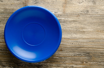 plate on a wooden background. plate top view. copy space
