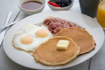 pancake with bacon and fried egg