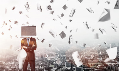 Businessman with laptop instead of head.