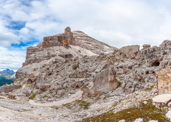 Panorama of  Cantore mountain hut and first world war ruines in the middle of expanse of cyclopean boulders near Fontananegra Pass, theater of fierce fighting in 1915 - 16, Tofane, Dolomites, Italy