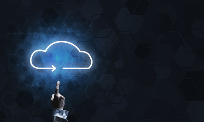 Technology idea concept with glowing cloud icon and touching it finger