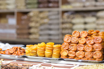 Pile of dried fruits, dried apricots prepared in various ways ar market or store