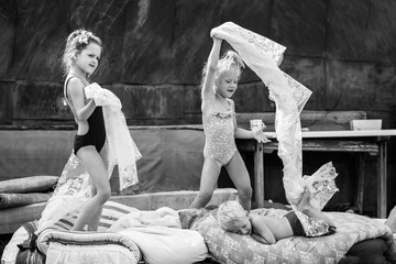 village children play in the courtyard in vogue