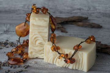 White handmade soap with tree bark and amber