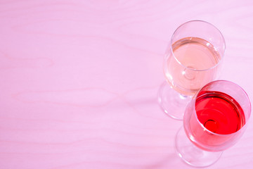 Two glasses with white and red wine
