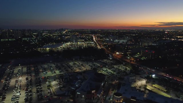 Aerial drone video twilight city lights