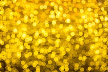 blured Christmas light  on gold abstract lights bokeh background