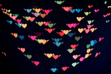 Multi color heart bokeh with black background