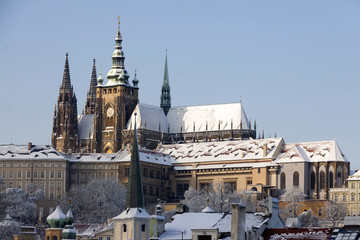 Christmas snowy Prague Lesser Town with gothic Castle, Czech republic