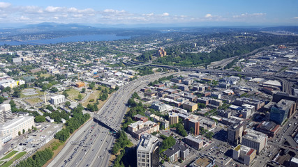 Fototapeta premium Aerial view of downtown Seattle buildings, Union Lake and I-5 Highway