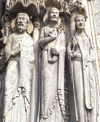 Fototapeta na wymiar Statues of Catholic Saints at Cathedrale Notre Dame de Chartres, a medieval old Catholic cathedral in Chartres, France