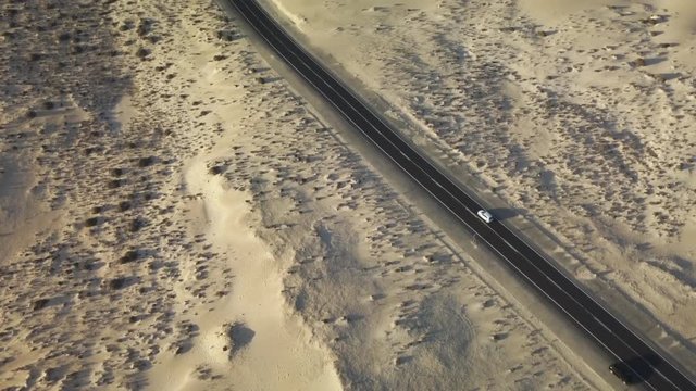 aerial view of road desert coast