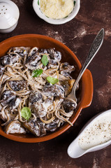 Dark spaghetti with mushrooms