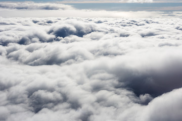 Flying above the clouds. view from the airplane