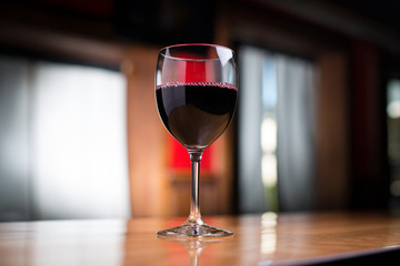 Low close up on red wine glass