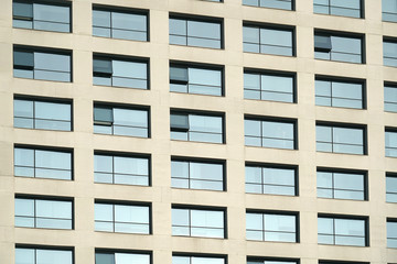close up on windows and wall of modern office building