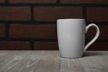 White coffee cup on table