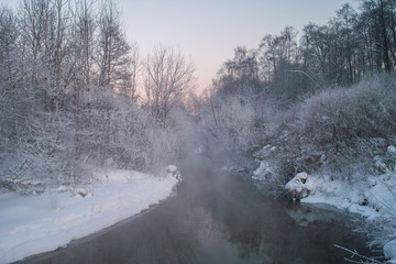 Obraz na płótnie Canvas River on the frozen winter day