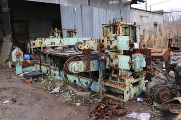Fototapeta na wymiar old abandoned rusty machine tool