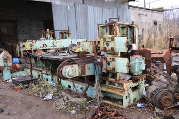 Fototapeta na wymiar old abandoned rusty machine tool