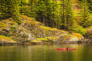 fjord in Norway and people kayaking