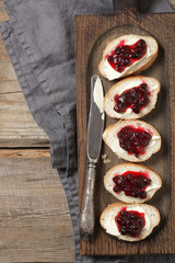 Sandwiches with butter and cranberry jam