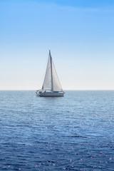 Fototapeta na wymiar isolated sailboat on blue Adriatic Sea