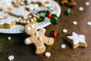 Homemade Christmas gingerbread cookies on vintage background. 