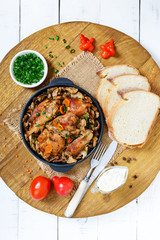Tender rabbit meat with forest mushrooms. A dietary dish. Top view.