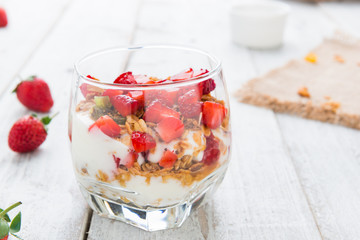 Strawberry , granola and yogurt healthy breakfast parfait