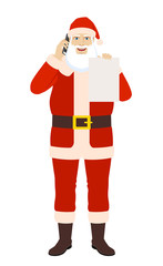 Santa Claus talking on the mobile phone and showing the blank paper