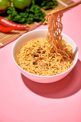 Traditional Asian instant noodles meal with vegetables © makistock