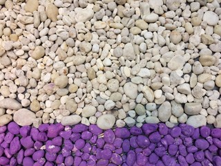 Round stones Purple and white walls background