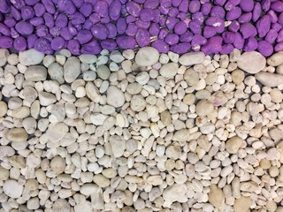 Round stones Purple and white walls background