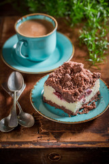 Rustic and homemade cheesecake served in blue porcelain