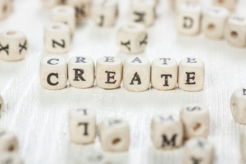 Create word written on wood block.