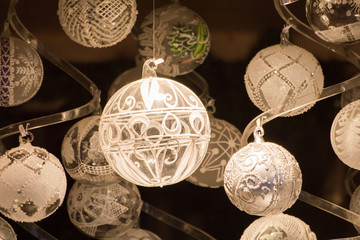 White Christmas globes on dark background