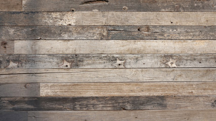 Fototapeta na wymiar Rustic distressed wood texture with stars