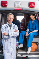 ambulance doctors working team looking at camera © LIGHTFIELD STUDIOS