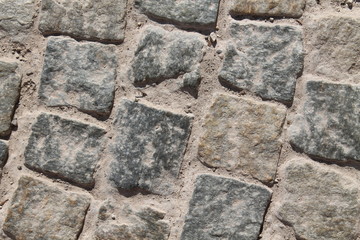 Street pavement background, rock texture
