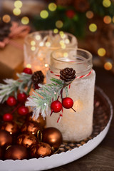 christmas decoration with handmade frosted jars for candles
