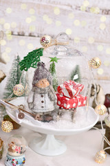 retro style christmas decoration with winter scene in glass dome