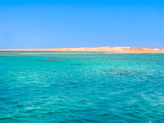 Background of Sharm el Sheikh, Sinai Peninsula, Egypt. Blue sea of Ras Mohammed National Park with...