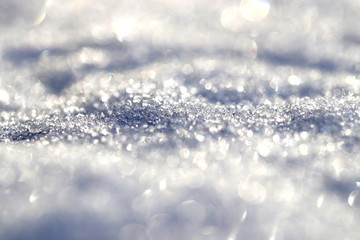 Hintergrund funkelnde Schneekristalle im Winter