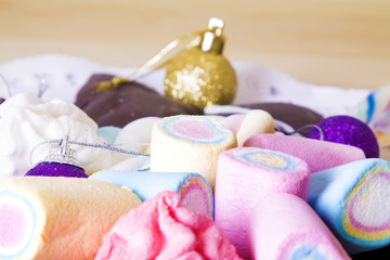 assortment of christmas gingerbread cookies and marshmallows