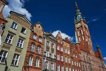 Facade historic tenement houses building and  town hall in Gdansk.