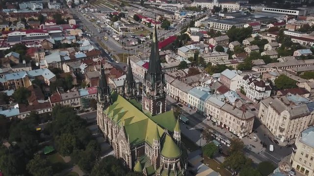 Fly around an old Gothic cathedral in old European city