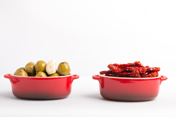 olives and dried tomato isolated on a white background